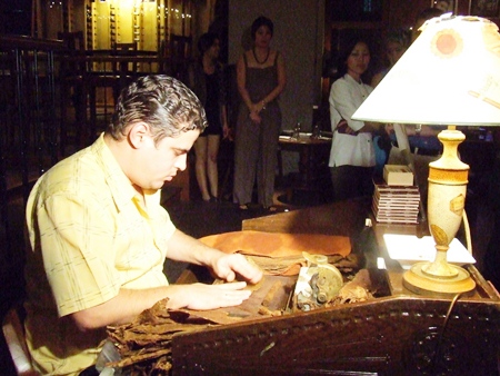 Hocnial Diaz Valdez demonstrates the fine art of cigar making.